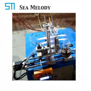 Stroj na pripevnenie rukovätí